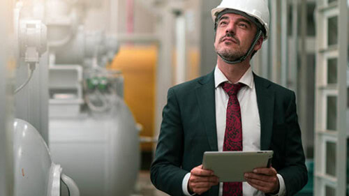 Portrait,Shot,Of,Senior,Engineer,Or,Management,Inspecting,Work,In